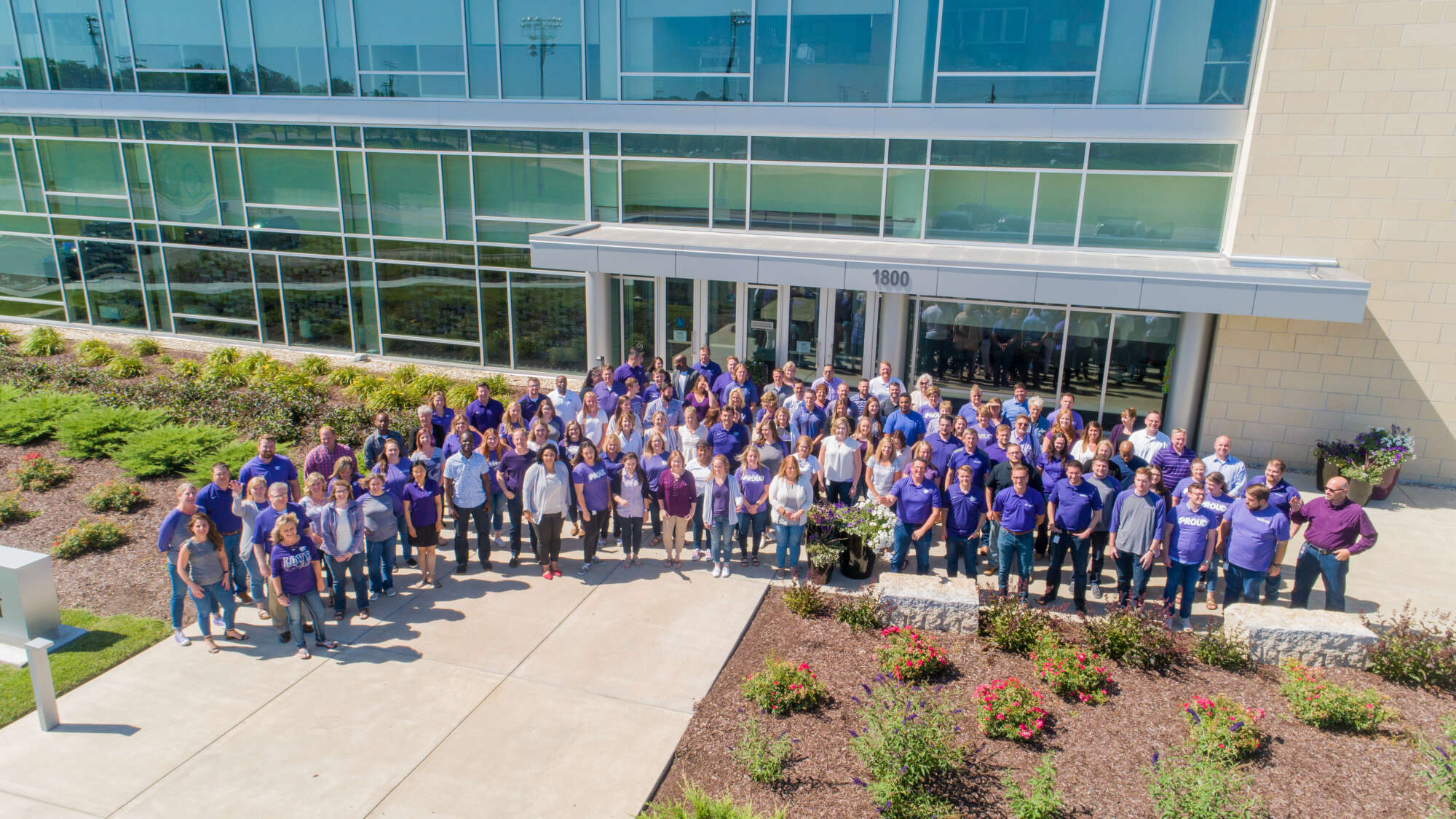 culture - staff photo in front of ksu foundation building