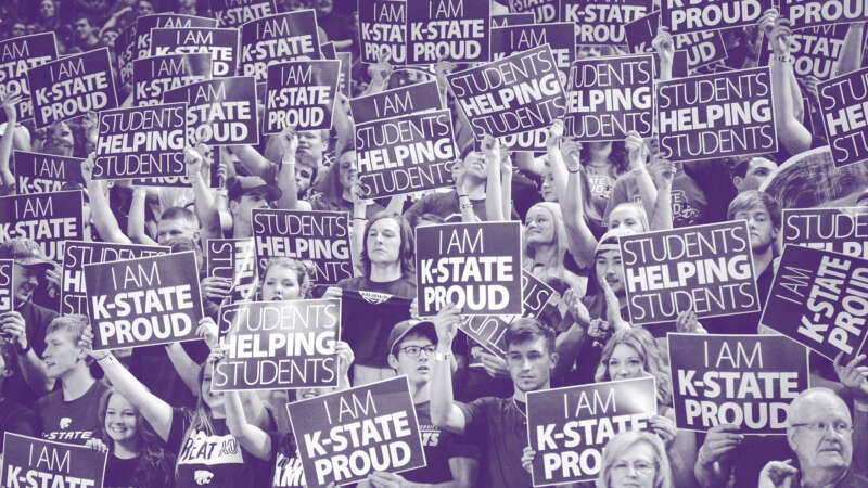 crowd with k-state proud signs