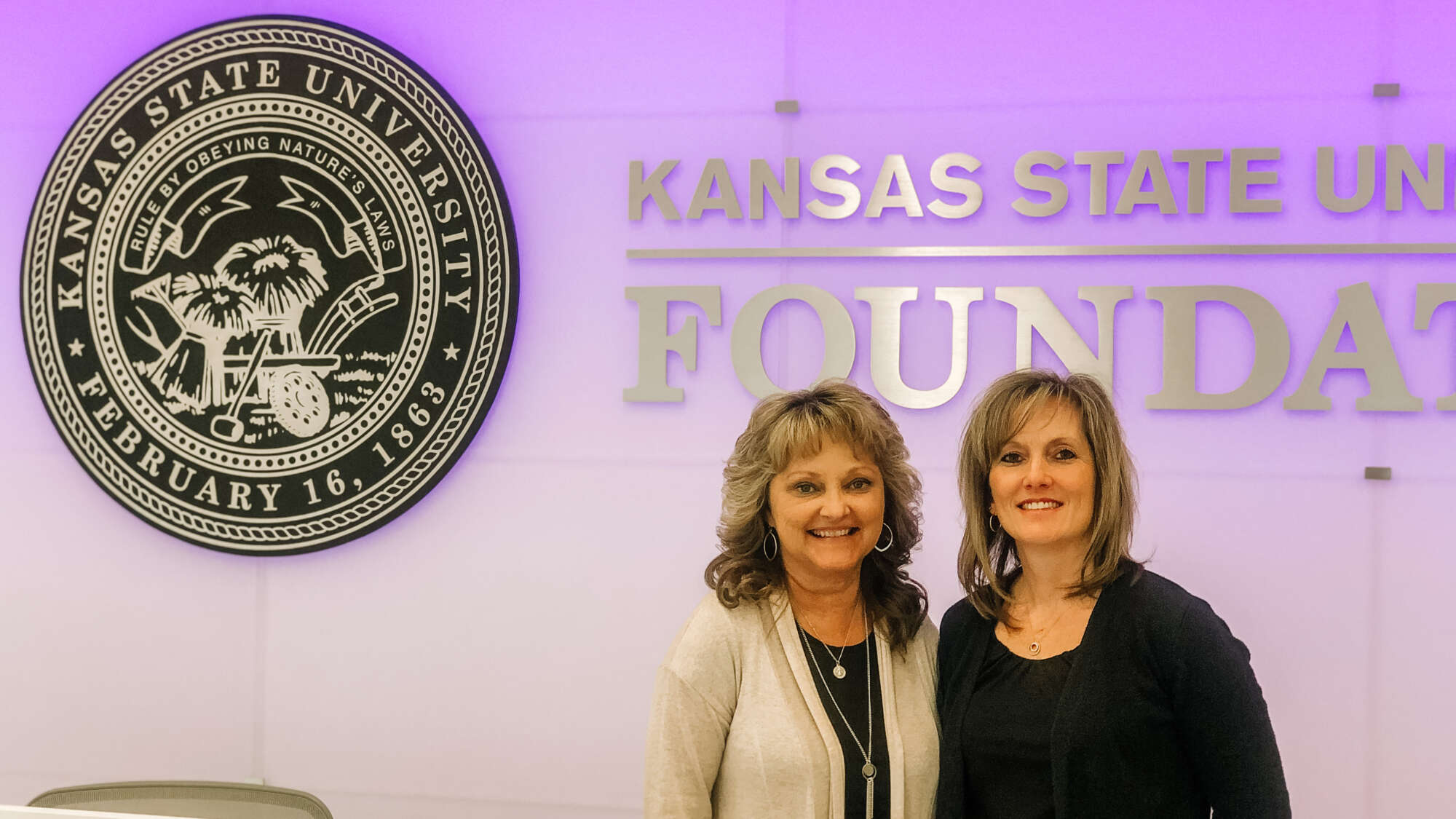 Career - two female employees at KSU Foundation front desk