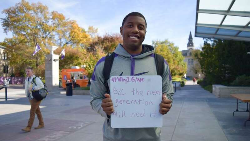 male student with whiteboard