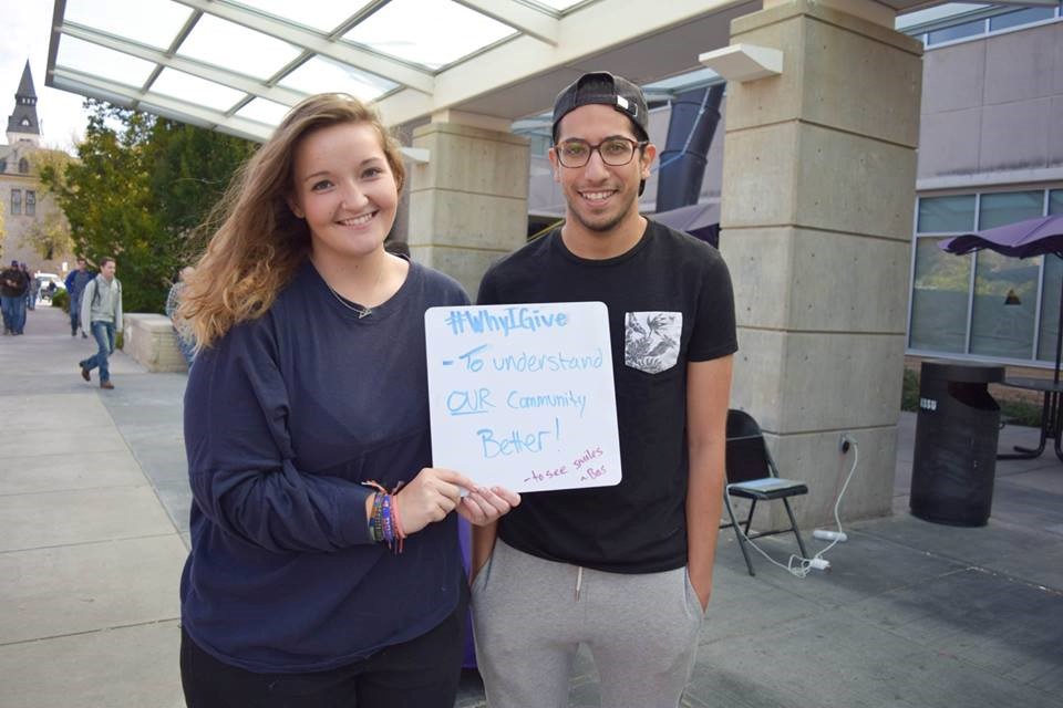 female and male students with whiteboard