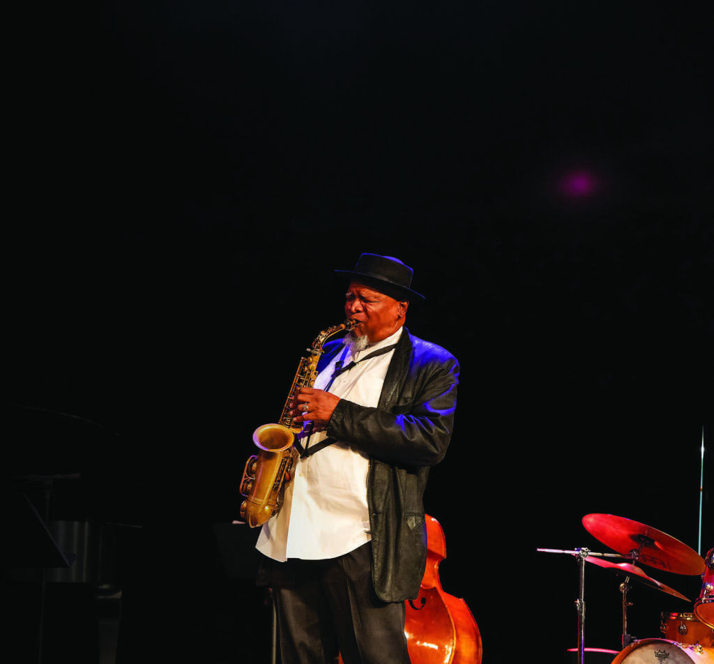 man playing saxophone 