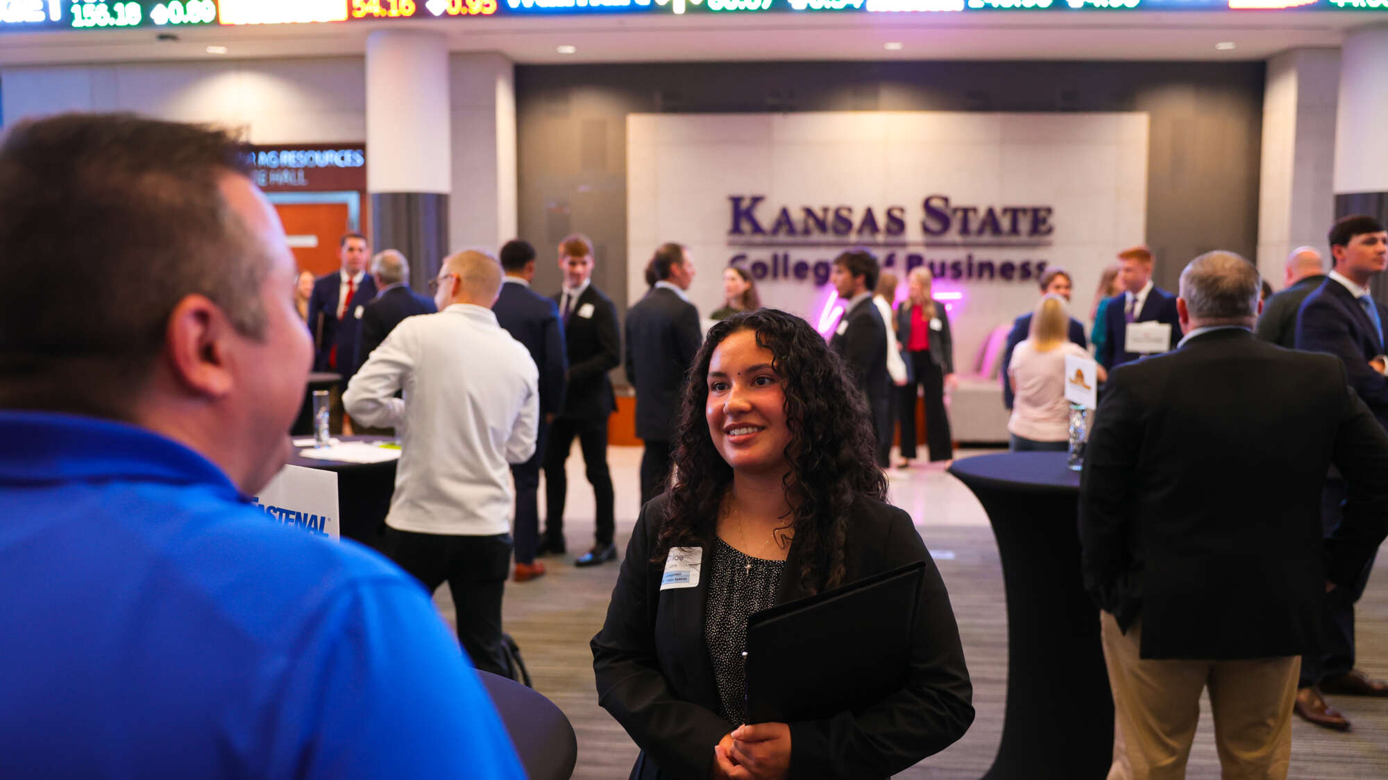 female student at a networking event