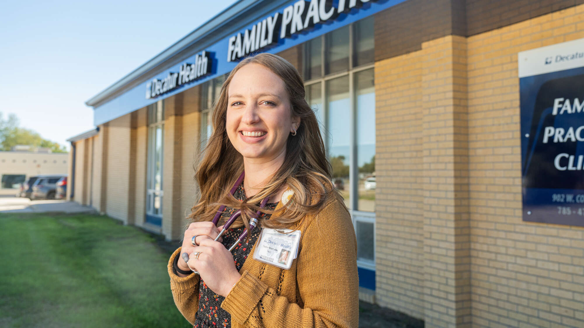 Taylor Niermeier stands in front of Decatur Health in Oberlin, Kansas