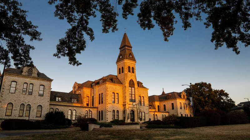 Anderson hall illuminated in evening light