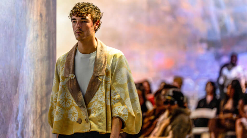 student models garment in fashion show